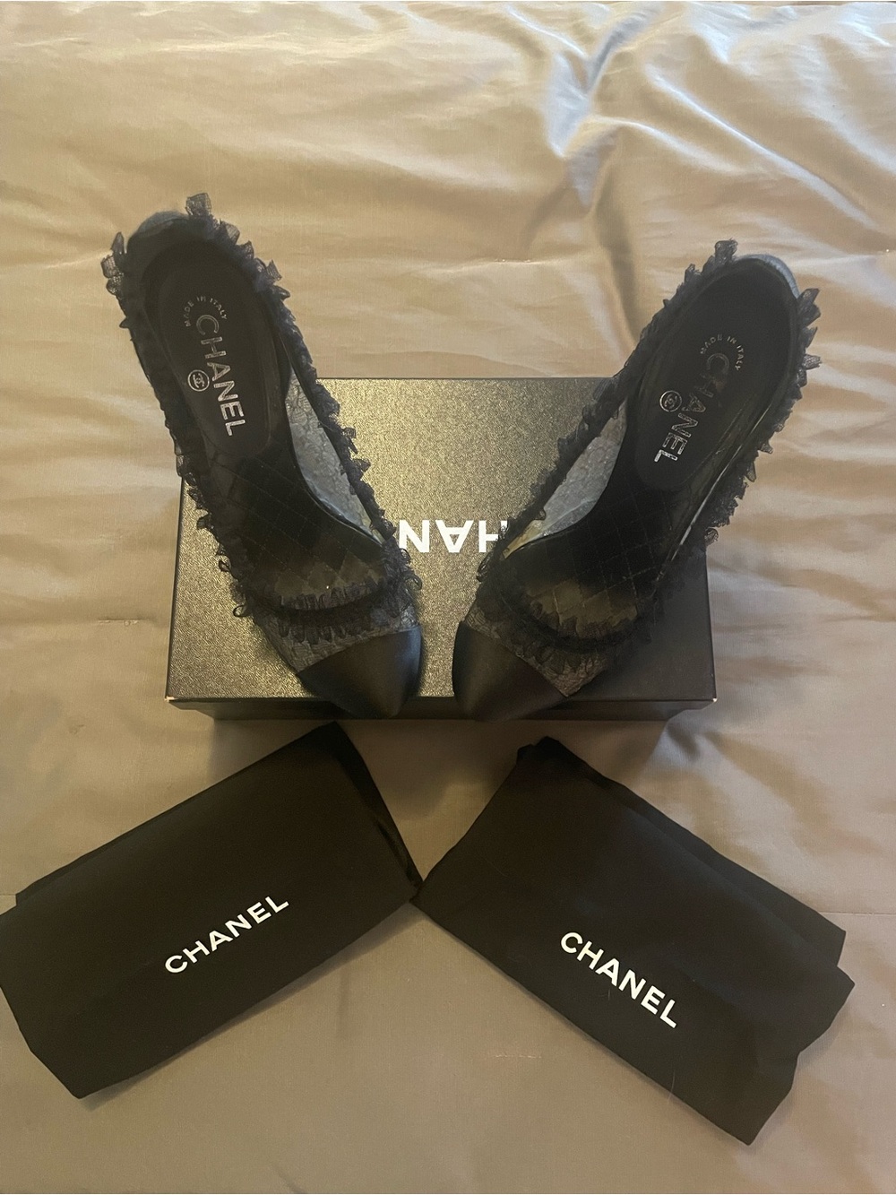 CHANEL Black Quilted Cap-Toe Heels with Lace Trim